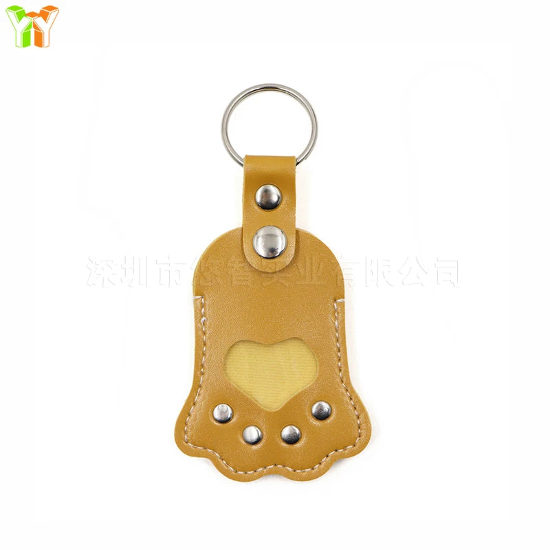 Premium Handcrafted Leather Pet Memorial Keychain with Cat Paw Motif and Hair Storage Pouch